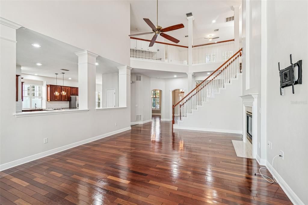 Fireplace, Interior, Pendant Lights, Recessed Lighting, Wood Texture Flooring