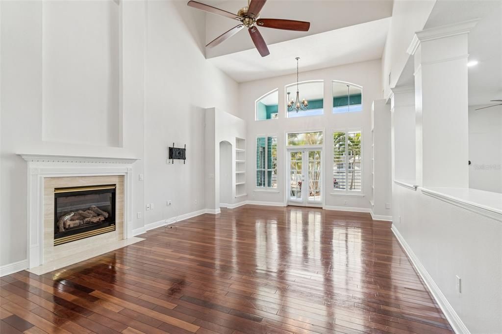 Chandelier, Fireplace, Interior, Recessed Lighting, Wood Texture Flooring