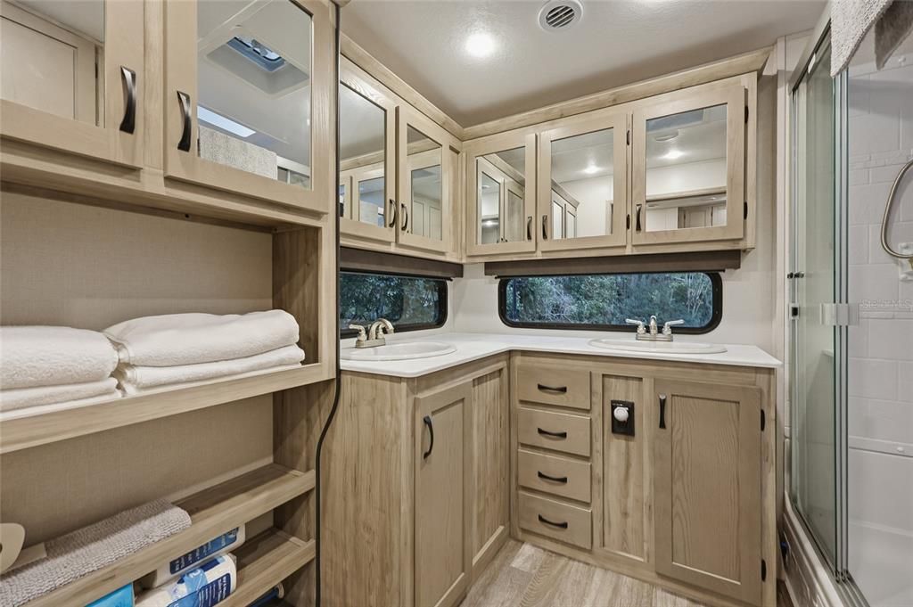 Bathroom, Dual Sink Vanities, Glass Shower, Interior, Recessed Lighting, Wood Texture Flooring