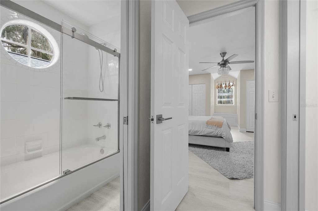 Bathroom, Bedroom, Glass Shower, Interior, Recessed Lighting, Wood Texture Flooring