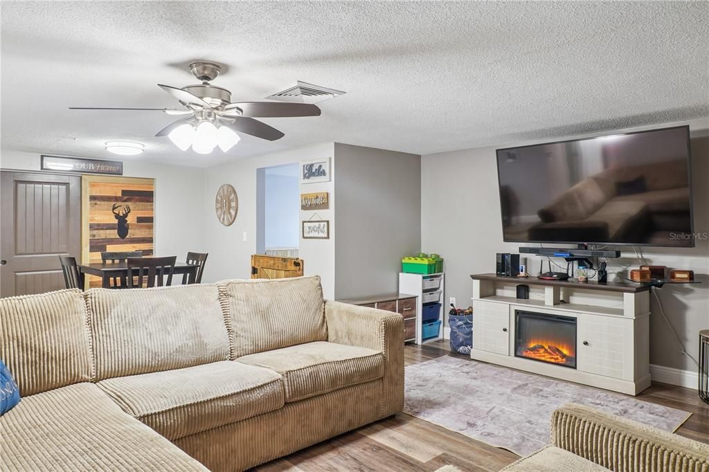 Dining room, Fireplace, Interior, Living room, Wood Texture Flooring