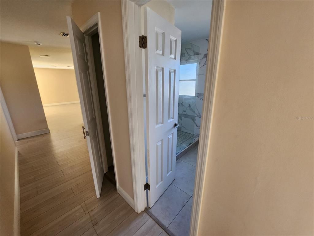 Interior, Marble Walls, Recessed Lighting, Wood Texture Flooring