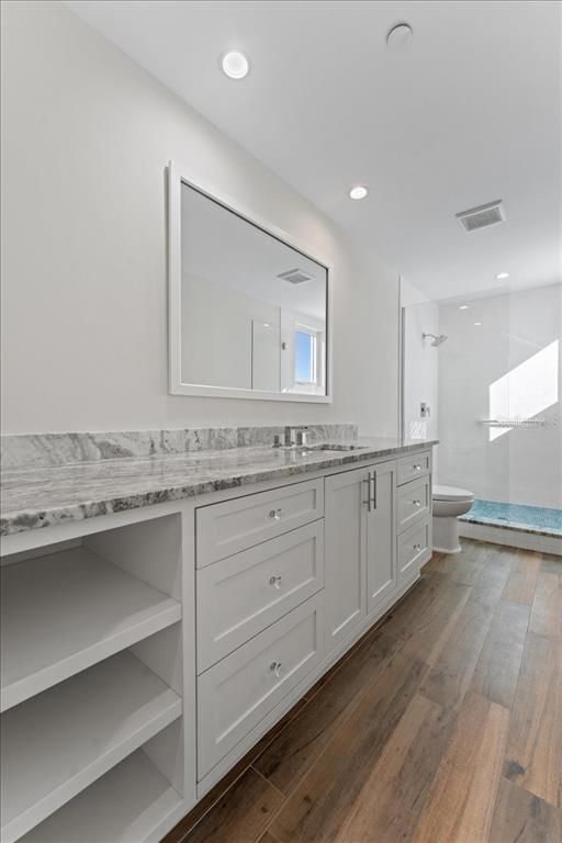 Bathroom, Dual Sink Vanities, Interior, Recessed Lighting, Wood Texture Flooring