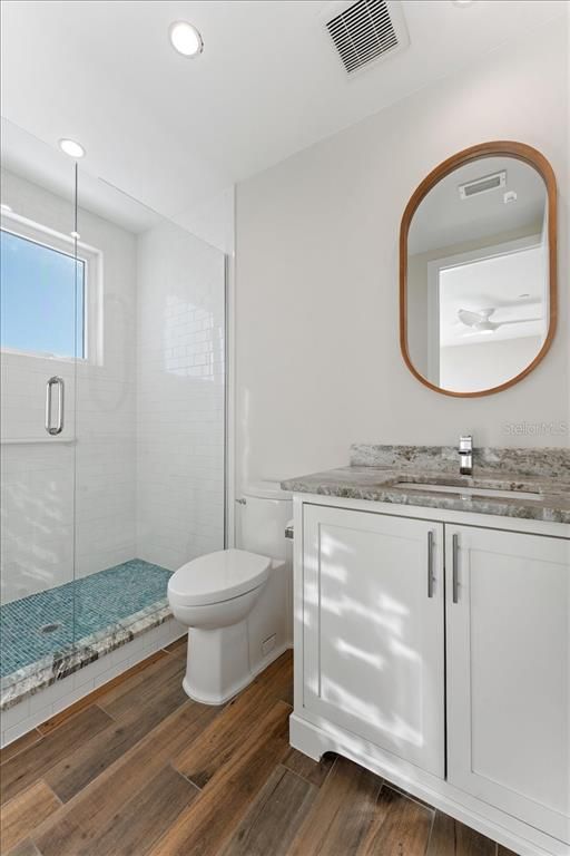 Bathroom, Glass Shower, Interior, Recessed Lighting, Wood Texture Flooring