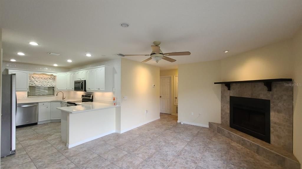 Fireplace, Interior, Kitchen, Recessed Lighting, Stainless Steel Appliances