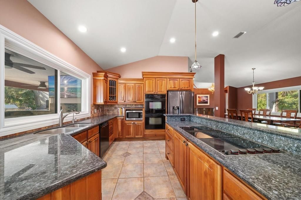 Chandelier, Dining room, Interior, Kitchen, Pendant Lights, Recessed Lighting, Stainless Steel Appliances