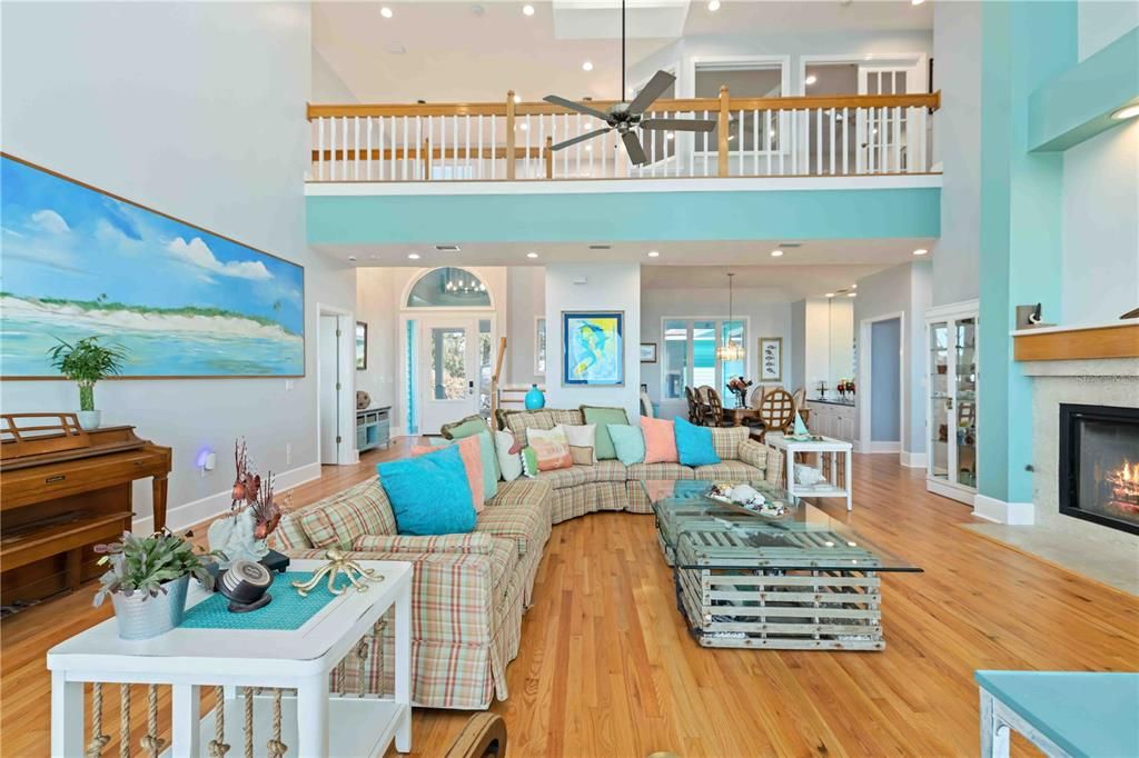 Dining room, Fireplace, Interior, Living room, Pendant Lights, Piano, Recessed Lighting, Wood Texture Flooring