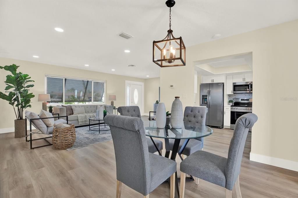 Dining room, Interior, Kitchen, Living room, Pendant Lights, Recessed Lighting, Stainless Steel Appliances, Wood Texture Flooring