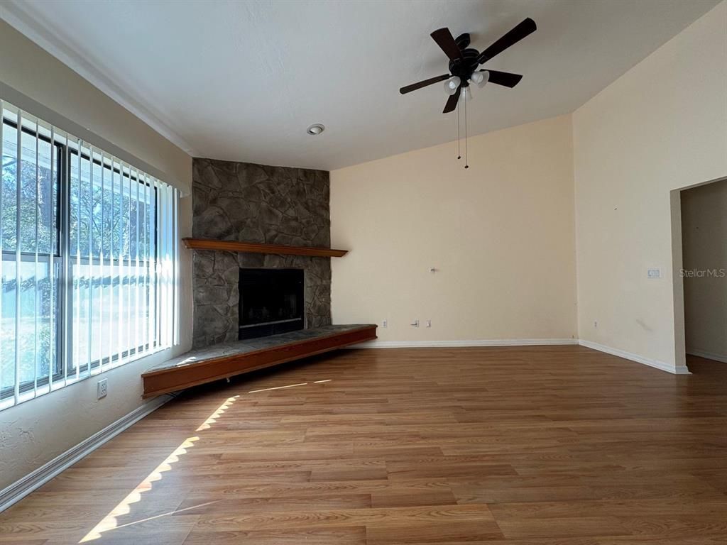 Empty room, Fireplace, Interior, Recessed Lighting, Wood Texture Flooring