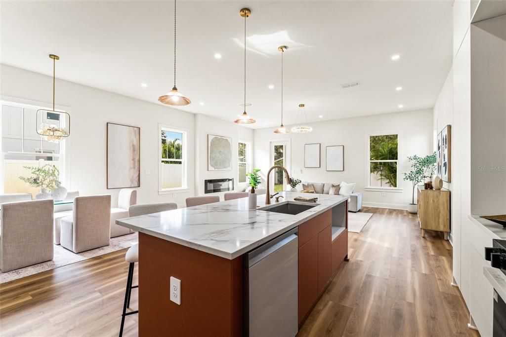 Dining room, Fireplace, Interior, Kitchen, Living room, Pendant Lights, Recessed Lighting, Stainless Steel Appliances, Wood Texture Flooring