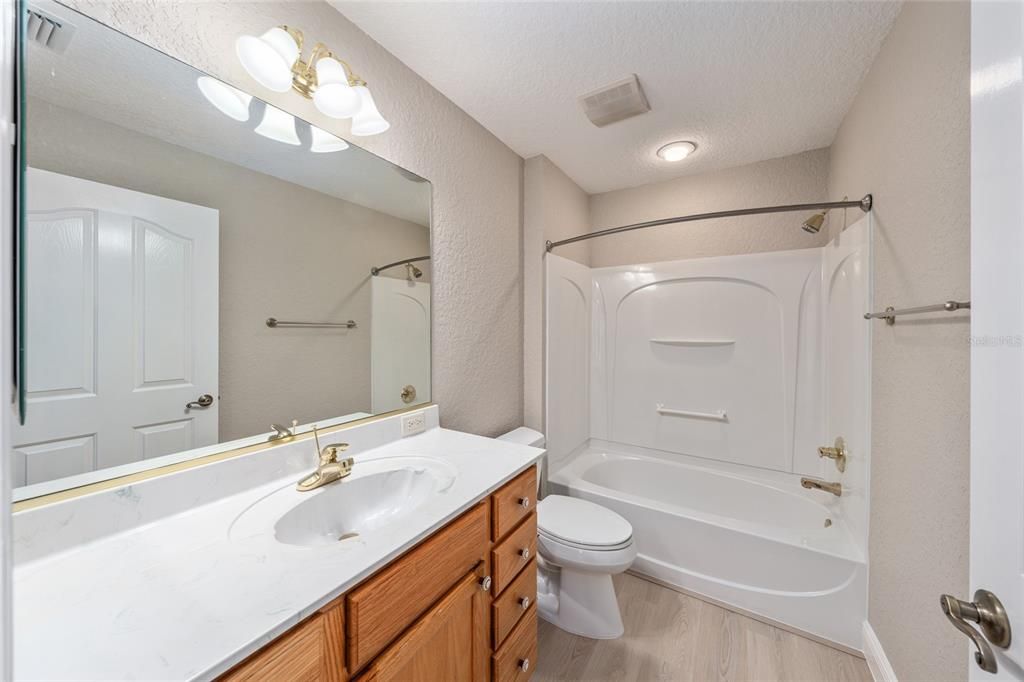 Bathroom, Dual Sink Vanities, Interior, Recessed Lighting, Wood Texture Flooring