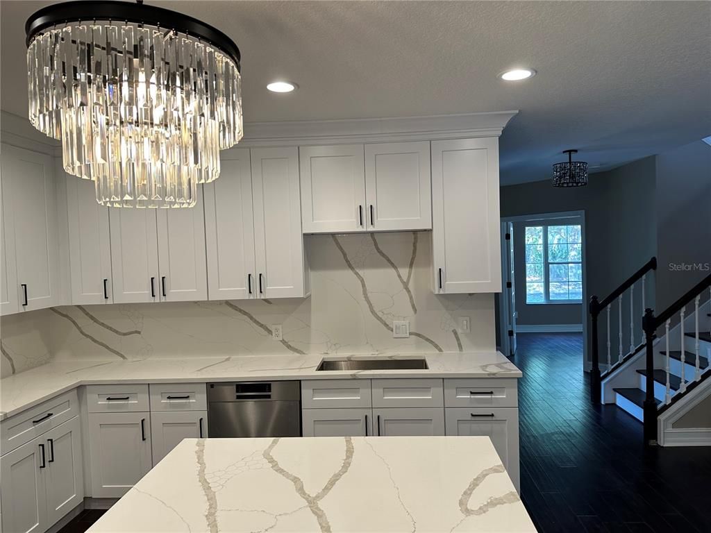 Chandelier, Interior, Kitchen, Marble Walls, Recessed Lighting, Wood Texture Flooring