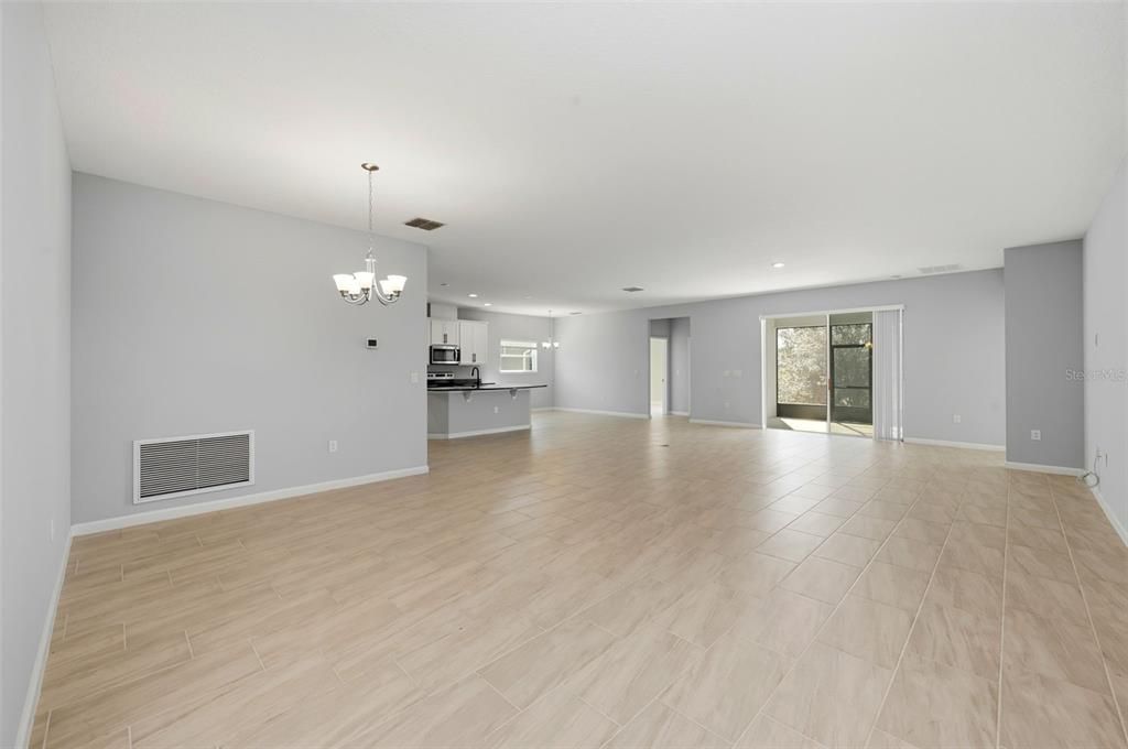 Chandelier, Empty room, Interior, Kitchen, Recessed Lighting, Wood Texture Flooring