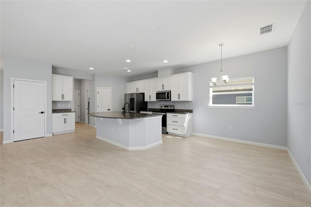 Chandelier, Empty room, Interior, Kitchen, Recessed Lighting, Stainless Steel Appliances