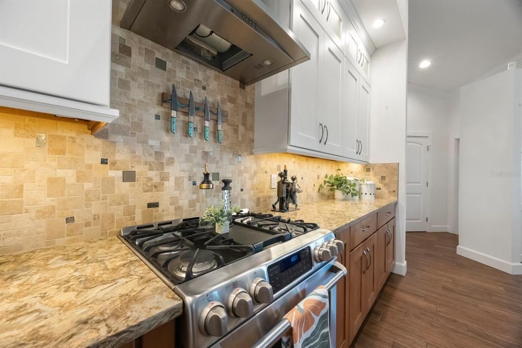 Interior, Kitchen, Recessed Lighting, Stainless Steel Appliances, Stone Walls, Wood Texture Flooring