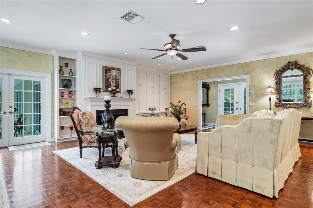 Dining room, Fireplace, Interior, Living room, Recessed Lighting, Wood Texture Flooring