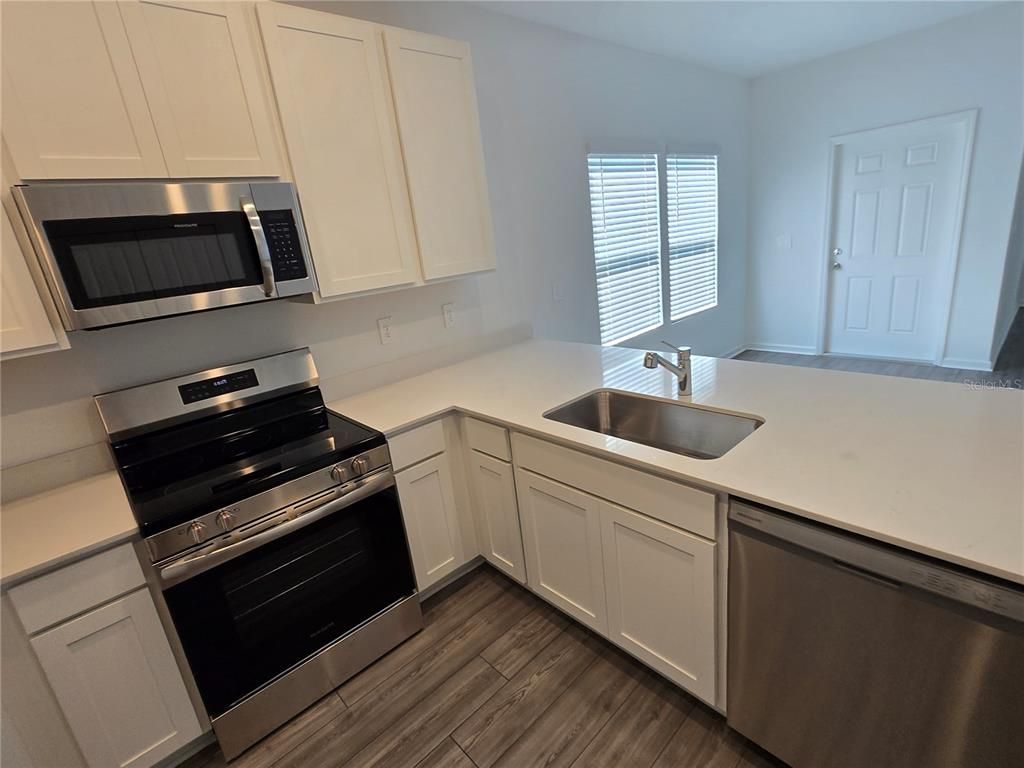 Interior, Kitchen, Stainless Steel Appliances, Wood Texture Flooring