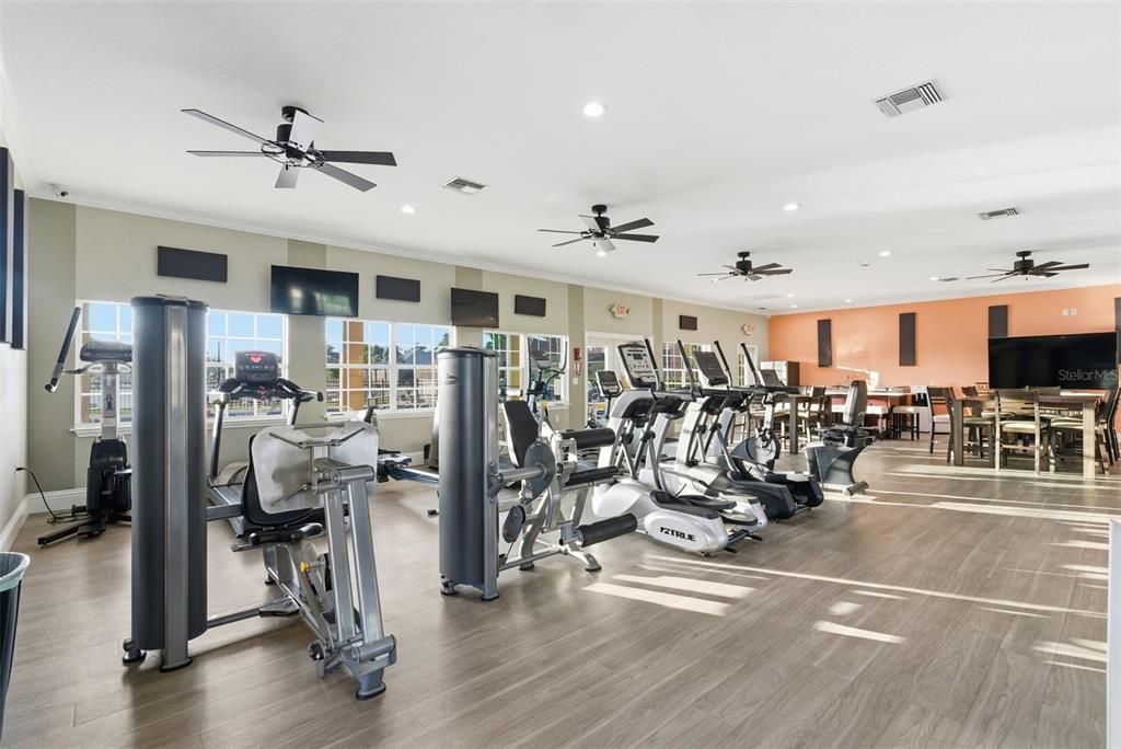 Dining room, Fitness Equipment, Gym, Interior, Recessed Lighting, Wood Texture Flooring