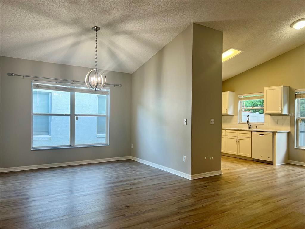 Empty room, Interior, Kitchen, Pendant Lights, Recessed Lighting, Wood Texture Flooring