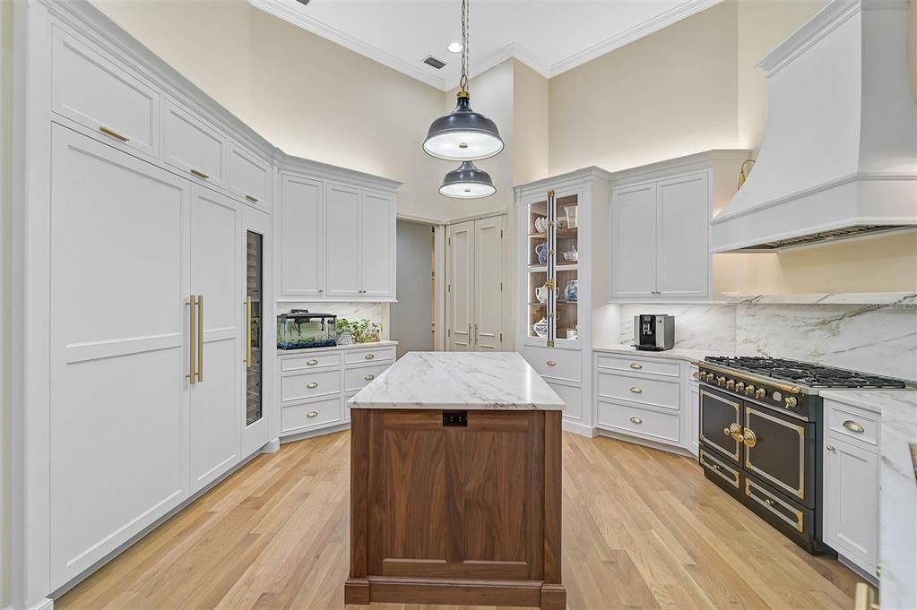 Interior, Kitchen, Marble Walls, Pendant Lights, Recessed Lighting, Wood Texture Flooring