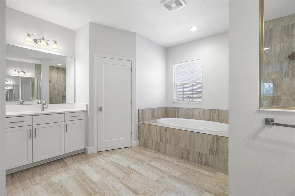Bathroom, Dual Sink Vanities, Interior, Recessed Lighting, Wood Texture Flooring