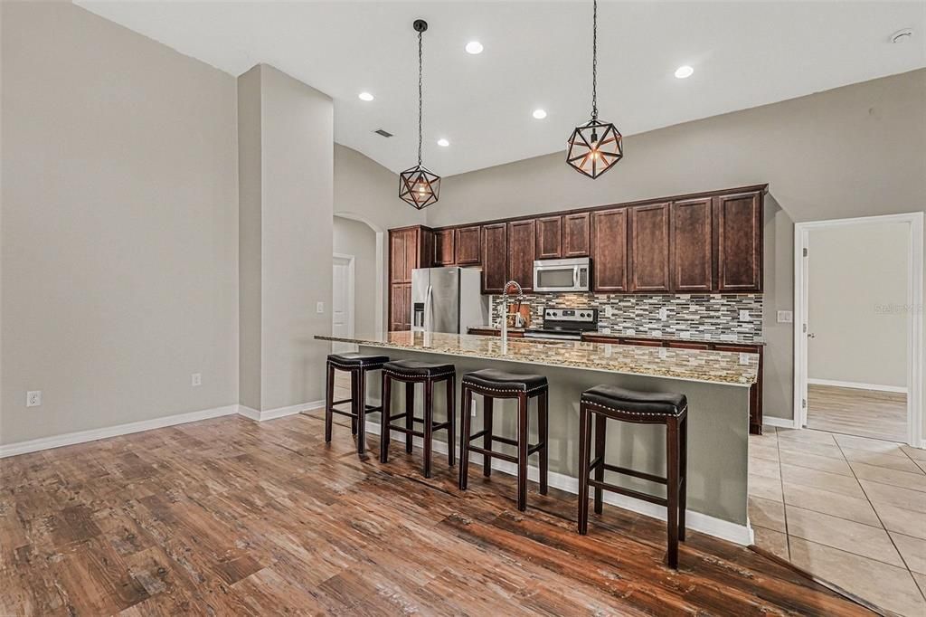 Interior, Kitchen, Pendant Lights, Recessed Lighting, Stainless Steel Appliances, Wood Texture Flooring