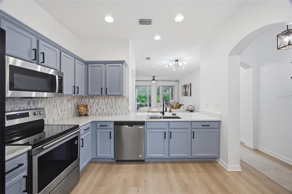 Interior, Kitchen, Pendant Lights, Recessed Lighting, Stainless Steel Appliances, Wood Texture Flooring