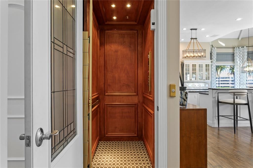Elevator, Interior, Pendant Lights, Recessed Lighting, Wood Texture Flooring, Wooden Walls