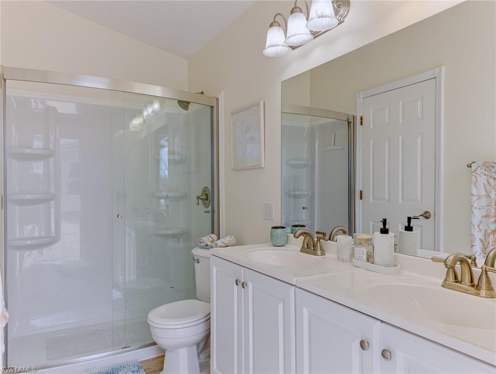 Bathroom, Dual Sink Vanities, Glass Shower, Interior, Wood Texture Flooring
