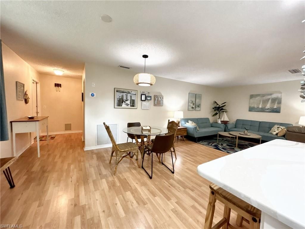 Dining room, Interior, Living room, Pendant Lights, Wood Texture Flooring