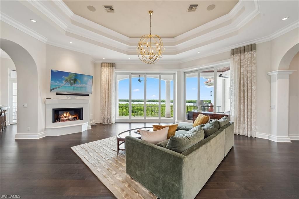 Chandelier, Fireplace, Interior, Living room, Recessed Lighting, Wood Texture Flooring