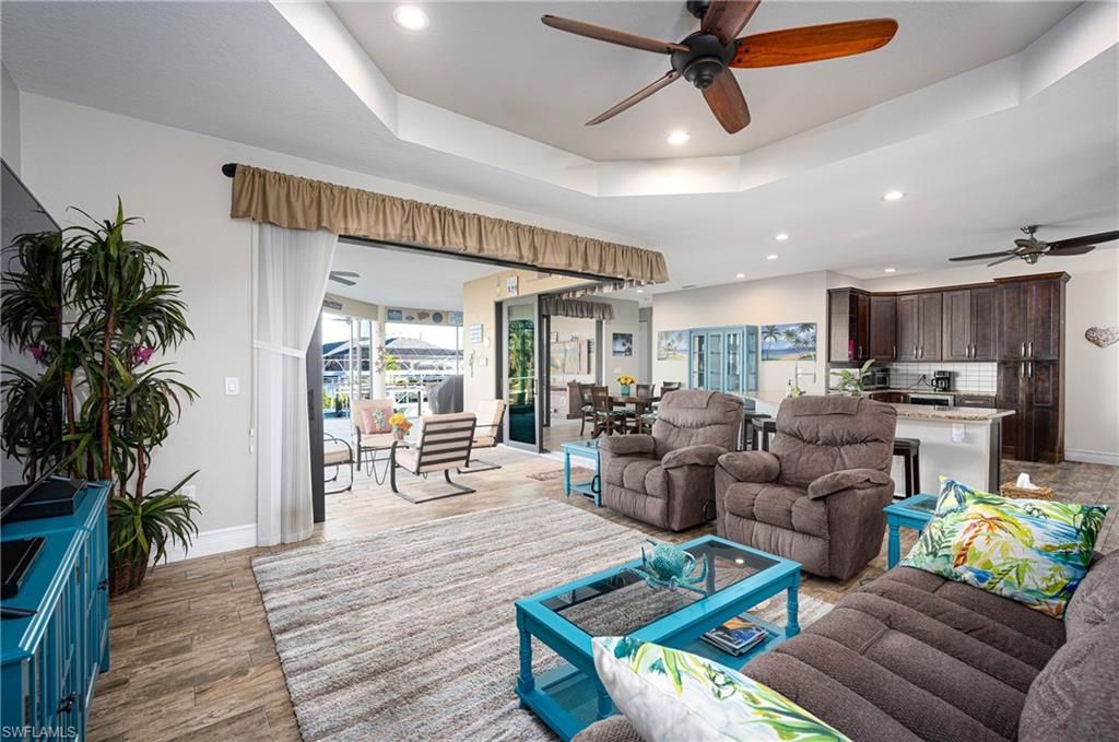 Dining room, Interior, Kitchen, Living room, Recessed Lighting, Stainless Steel Appliances, Wood Texture Flooring