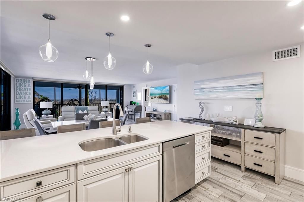 Dining room, Interior, Kitchen, Living room, Pendant Lights, Recessed Lighting, Stainless Steel Appliances, Wood Texture Flooring