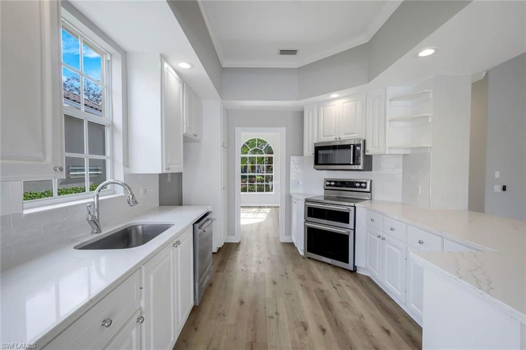 Interior, Kitchen, Recessed Lighting, Stainless Steel Appliances, Wood Texture Flooring