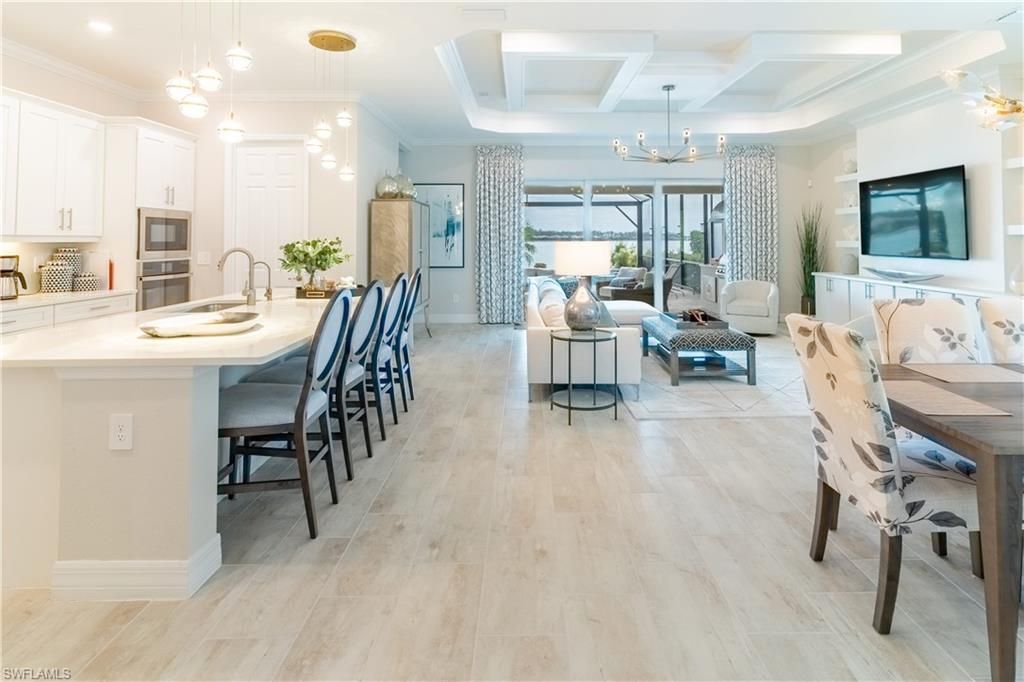 Chandelier, Interior, Kitchen, Living room, Pendant Lights, Recessed Lighting, Stainless Steel Appliances, Wood Texture Flooring