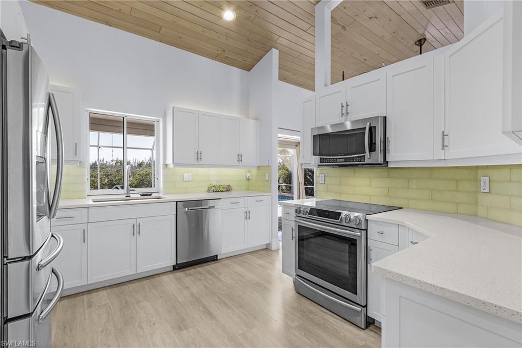 Interior, Kitchen, Recessed Lighting, Stainless Steel Appliances, Wooden Ceilings, Wood Texture Flooring
