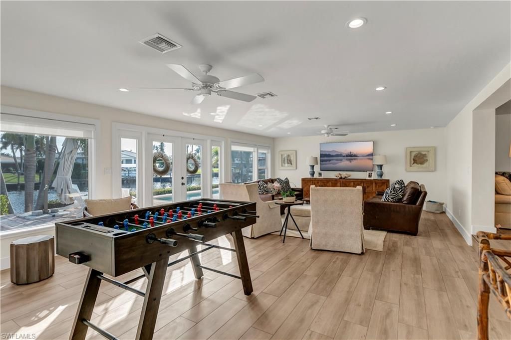 Billiard Table, Game Room, Interior, Living room, Recessed Lighting, Wood Texture Flooring