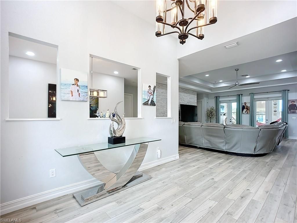 Chandelier, Interior, Living room, Recessed Lighting, Wood Texture Flooring