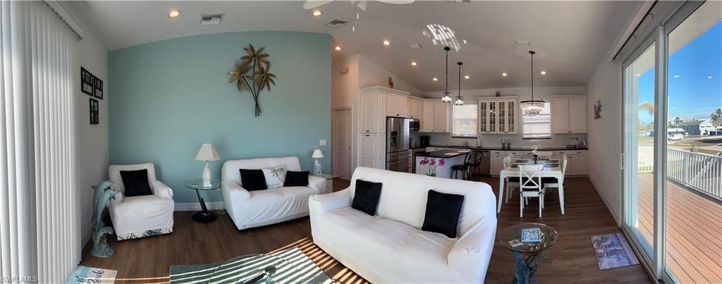 Dining room, Interior, Kitchen, Living room, Pendant Lights, Recessed Lighting, Stainless Steel Appliances, Wood Texture Flooring