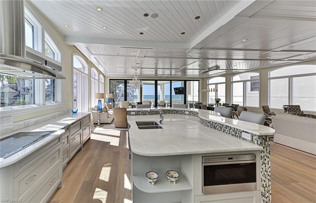 Chandelier, Dining room, Interior, Kitchen, Living room, Pendant Lights, Recessed Lighting, Wood Texture Flooring