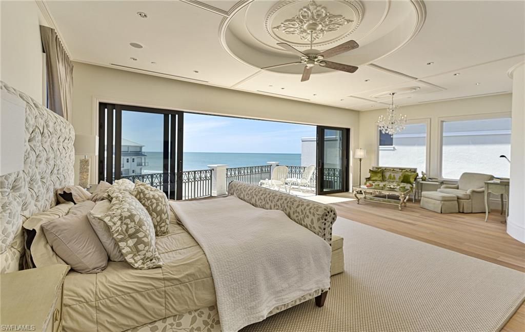 Bedroom, Chandelier, Fireplace, Interior, Living room, Recessed Lighting, Water, Wood Texture Flooring
