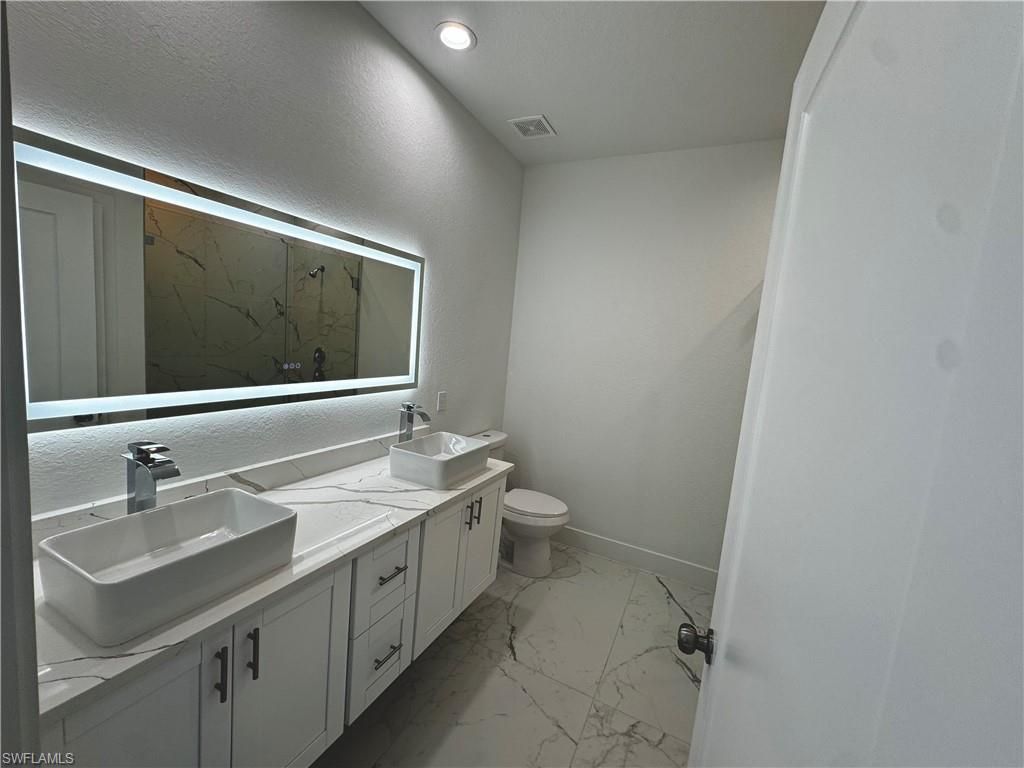 Bathroom, Dual Sink Vanities, Interior, Marble, Recessed Lighting