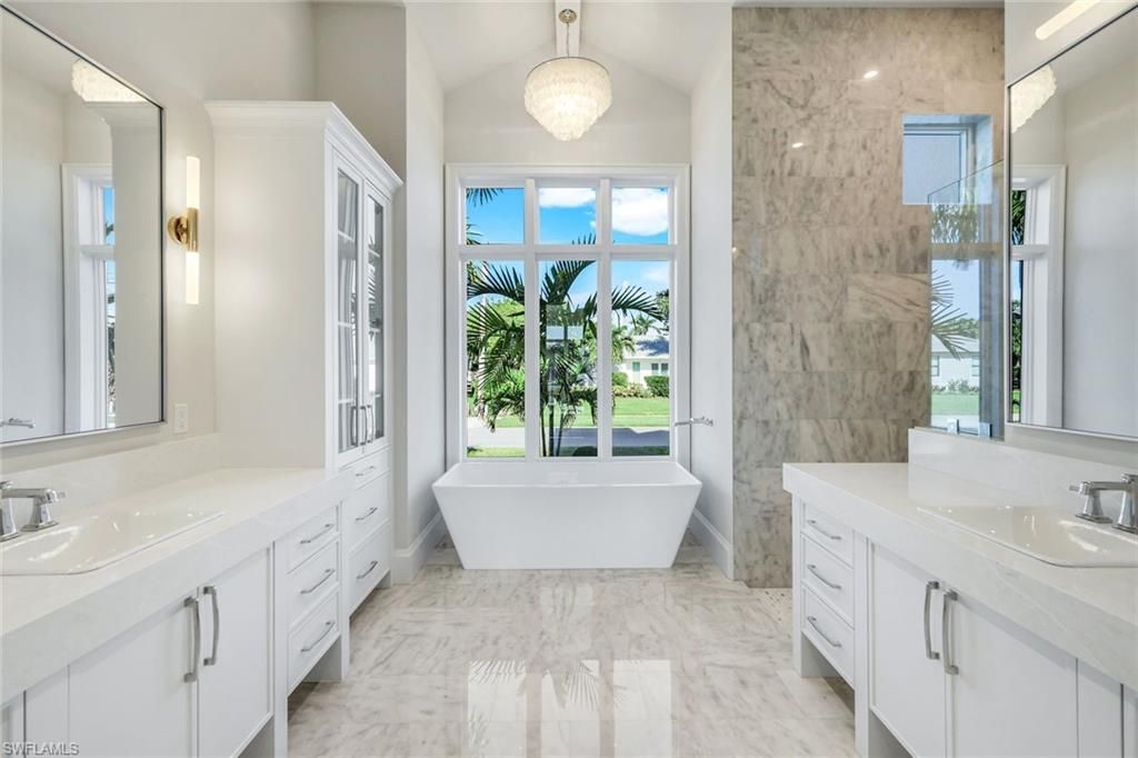 Bathroom, Dual Sink Vanities, Free Standing Baths, Interior, Marble, Marble Walls, Pendant Lights