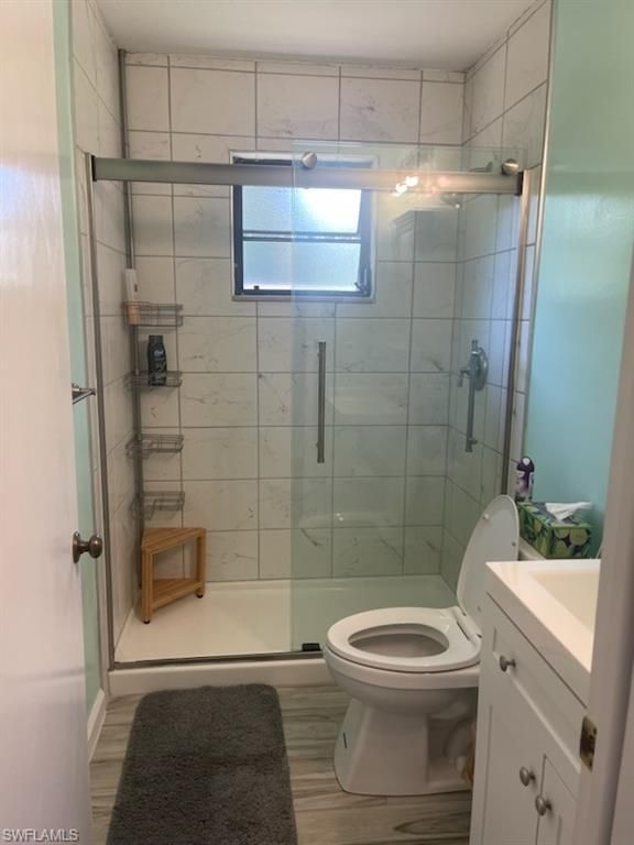 Bathroom, Glass Shower, Interior, Marble Walls, Wood Texture Flooring