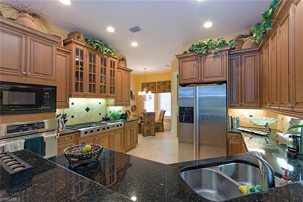 Chandelier, Dining room, Interior, Kitchen, Pendant Lights, Recessed Lighting, Stainless Steel Appliances