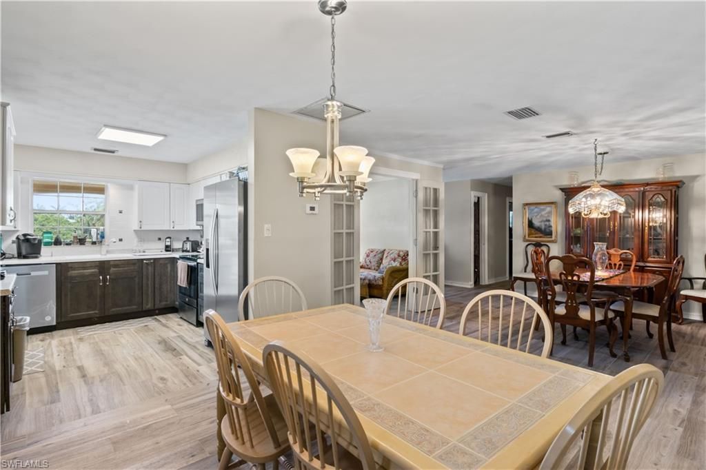 Chandelier, Dining room, Interior, Kitchen, Pendant Lights, Wood Texture Flooring