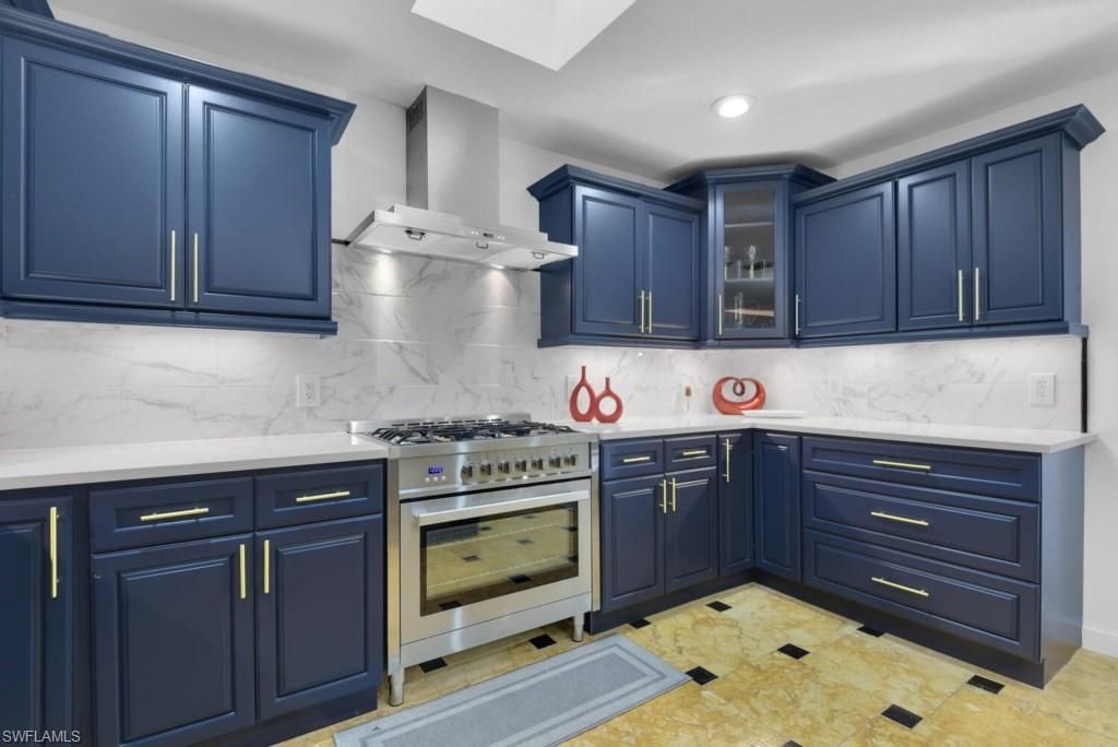 Interior, Kitchen, Marble Walls, Recessed Lighting, Stainless Steel Appliances