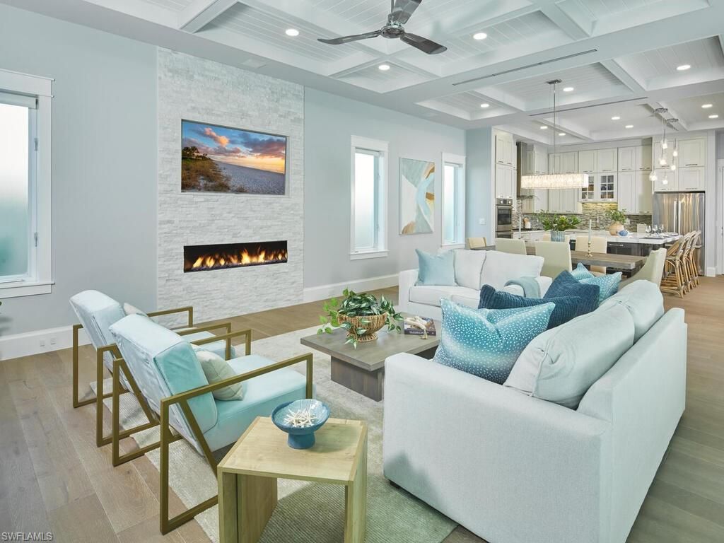 Dining room, Fireplace, Interior, Kitchen, Living room, Pendant Lights, Recessed Lighting, Stainless Steel Appliances, Stone Walls, Wood Texture Flooring