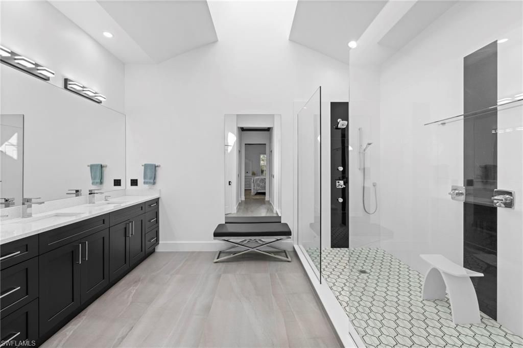 Bathroom, Dual Sink Vanities, Glass Shower, Interior, Recessed Lighting, Wood Texture Flooring
