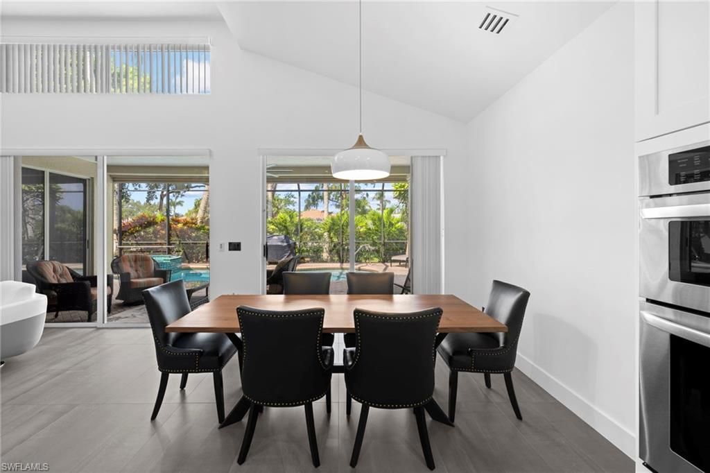 Dining room, Interior, Kitchen, Pendant Lights, Stainless Steel Appliances, Wood Texture Flooring